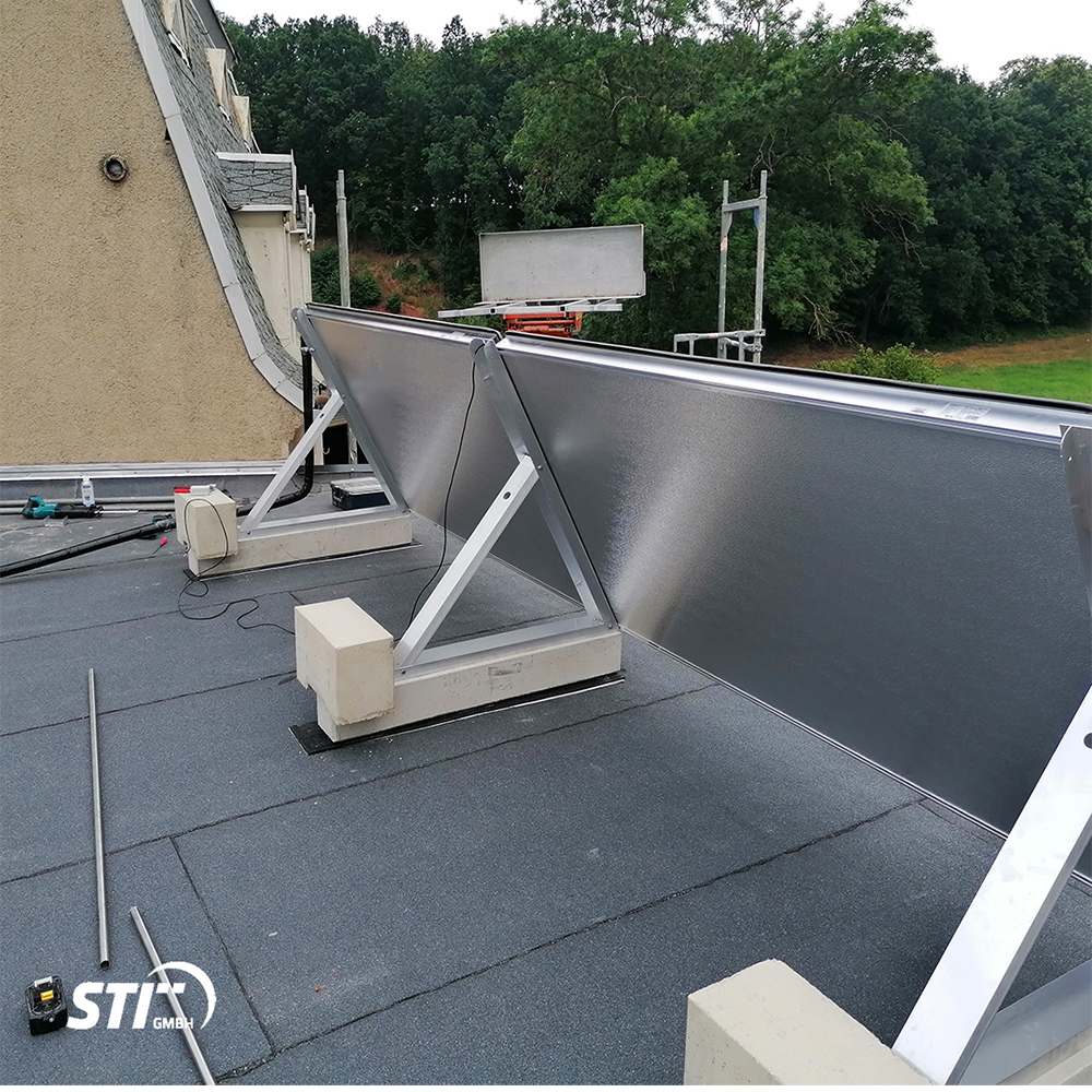 Flachdach Montageset für STI FKF 200H Flachkollektoren - einreihig mit Betonsockel Flachdach Montageset für STI FKF 200H Flachkollektoren - einreihig mit Betonsockel